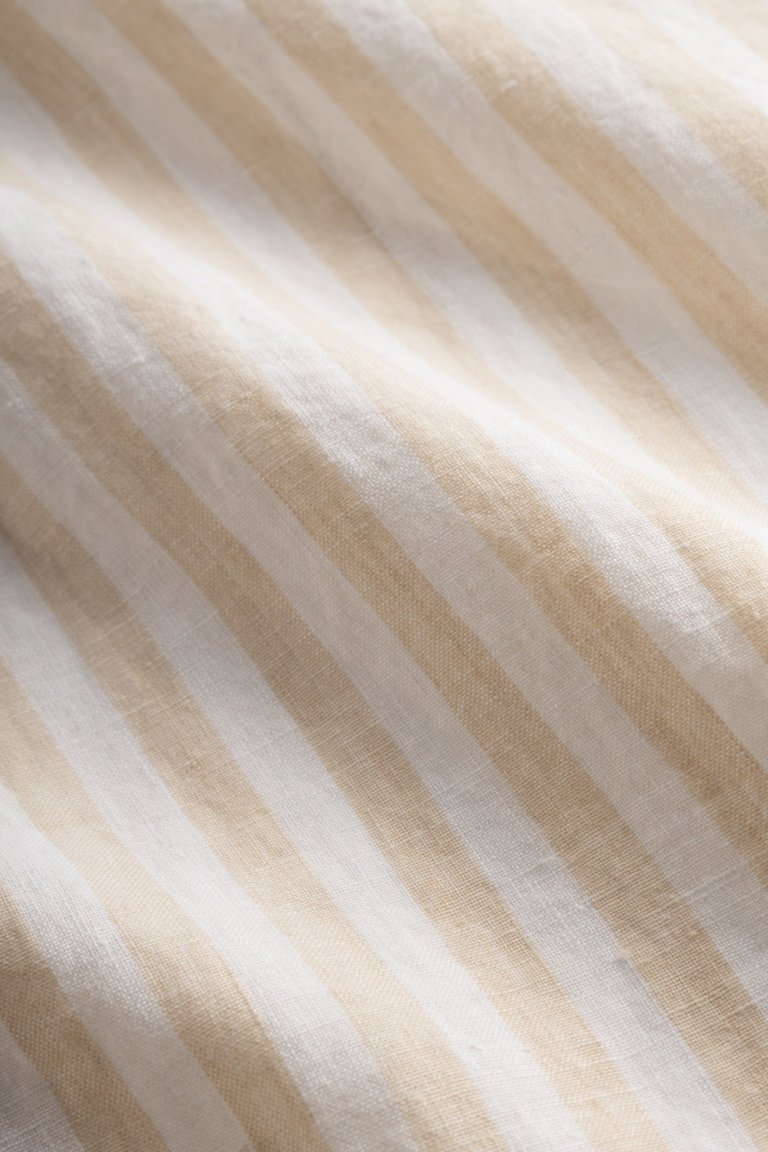 ekologisk linskjorta dam oversize randig beige närbild