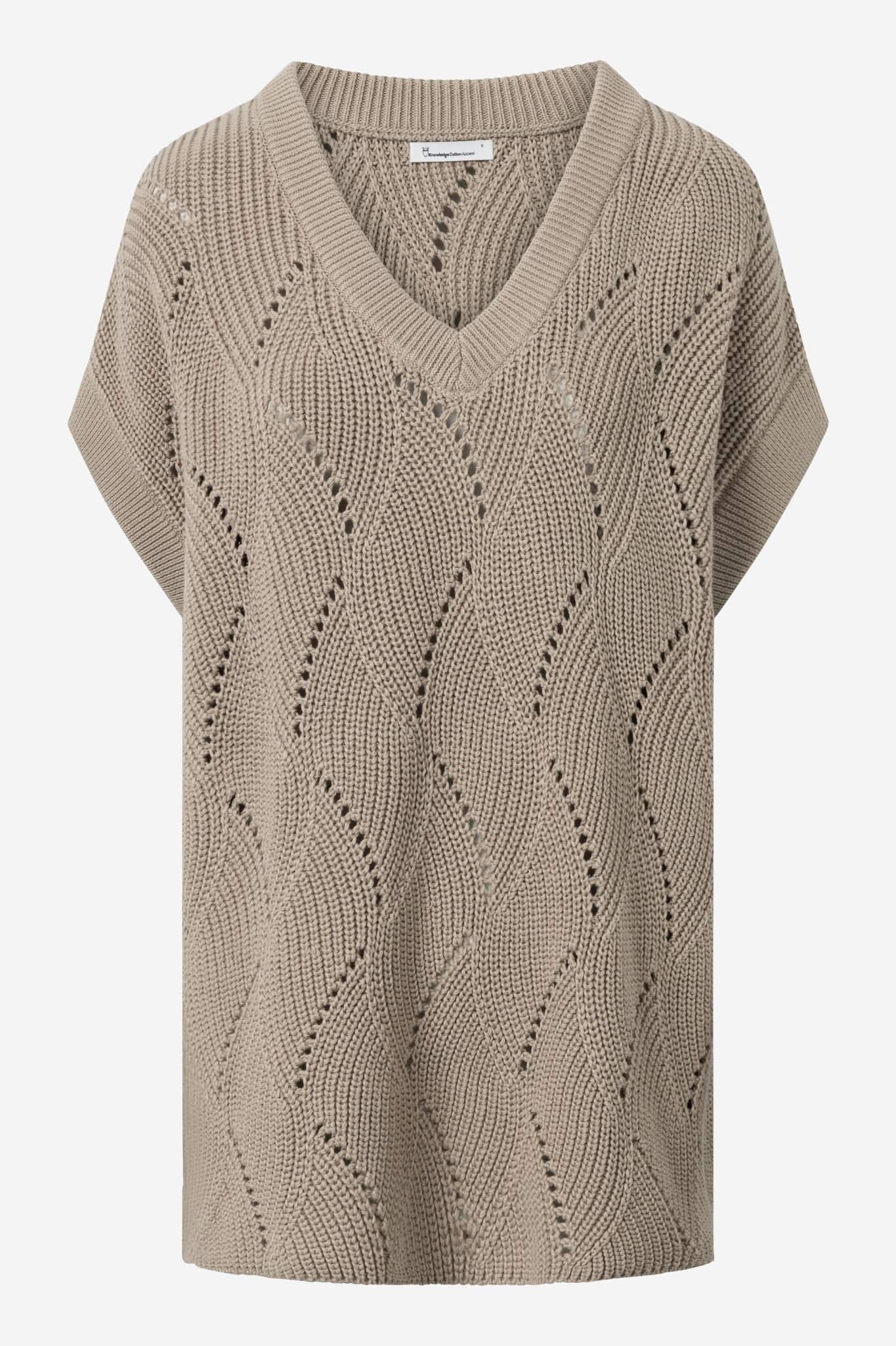 ekologisk väst mönsterstickad bomull lång oversize beige