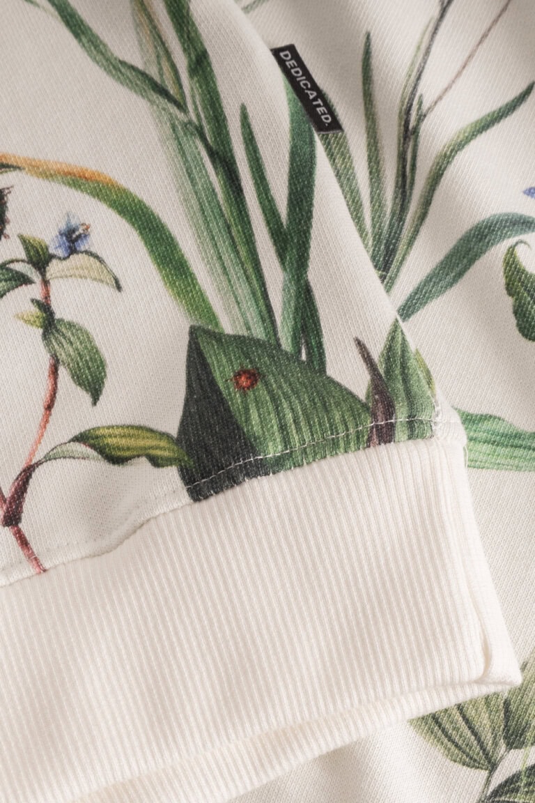 ekologisk tröja sweatshirt dam flower field aop ystad detalj midjemudd